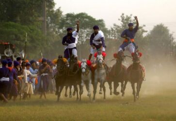 Nihang Sikhs show their skills during Fateh Diwas, a religious procession taken out to mark the Bandi Chorh Diwas in Amritsar. (APHIMAGES)