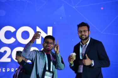 TiEcon volunteers, Vansh Gupta and Vaibhav Deshmukh share a coffee at the TiEcon 2023 Grand Keynote Stage. TiEcon volunteers, Vansh Gupta and Vaibhav Deshmukh share a coffee at the TiEcon 2023 Grand Keynote Stage.