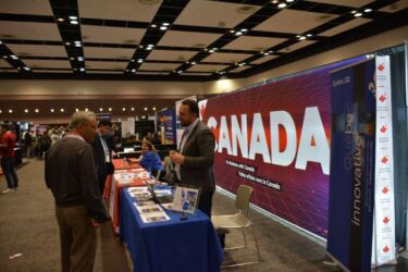 Canada had a prominent exhibit promoting the country as the land of opportunity. Canada had a prominent exhibit promoting the country as the land of opportunity.
